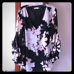 Gorgeous floral blouse with sheer bell sleeves